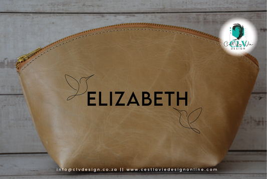 GENUINE LEATHER CURVED COSMETIC BAG