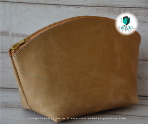 GENUINE LEATHER CURVED COSMETIC BAG