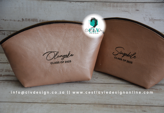 GENUINE LEATHER CURVED COSMETIC BAG