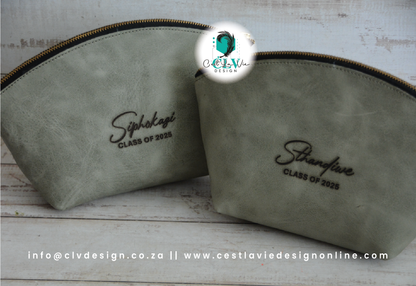 GENUINE LEATHER CURVED COSMETIC BAG