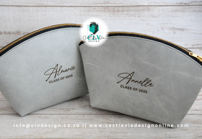 GENUINE LEATHER CURVED COSMETIC BAG