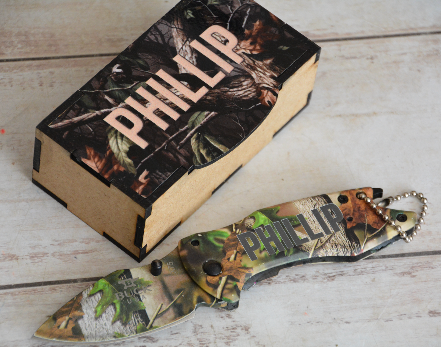 BUCK KNIFE WITH CAMO PRINT